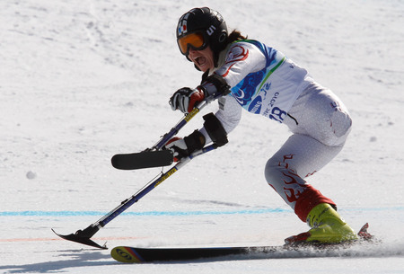 Ilya Pitalev. French alpine skier Natalie Teac racing in the giant slalom event. Whistler, Canada