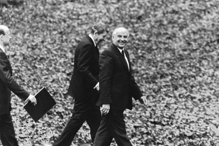 Walk in a garden of the White house. Ronald Reagan and Michael Gorbachev. Washington