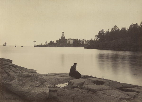 Monk with St. Nicholas Skete in the background.
From the album 'Views of Valaam Monastery'.
1887.
Courtesy of the National Library of Russia, St. Petersburg