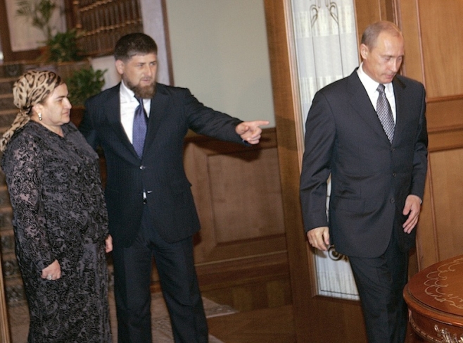 Dmitry Azarov.
Vladimir Putin, Ramzan Kadyrov, and Aimani Kadyrova (Ahmad Kadyrov’s widow) in the Bocharov Ruchey Residence of the Russian President on the eve of Ahmad Kadyrov’s Birthday. Sochi, August 2005.
Courtesy Kommersant