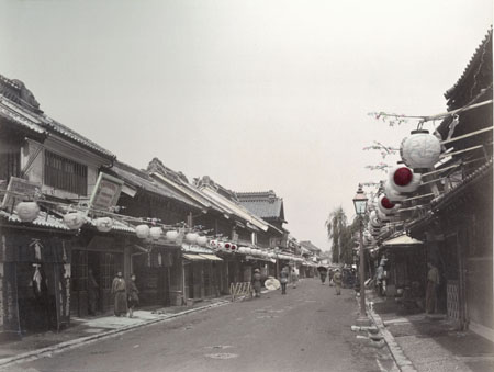 Unknown author.
Business street in Yokohama. 
1890s