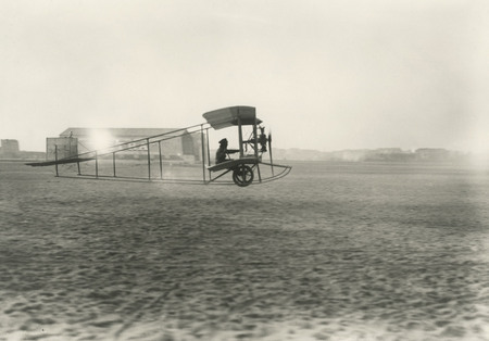 Jacques-Henri Lartigue.
Aviator Jean Chei in “Kodron” airplane. Issy-les-Moulineaux. 
February, 1910.
© Ministry of culture and communications of France/ Association of Jacques-Henri Lartigue’s friends