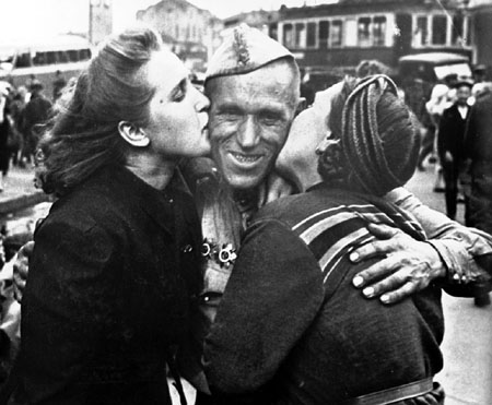 Anatoly Morozov.
Soldier - Winner in His Wife’s and Daughter’s Embraces. Moscow. 
1945