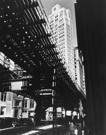 Berenice Abbott.
“El”, Second and Third Avenue Lines. Hanover and Pearl Streets. 
March 6, 1936. 
Museum of the City of New York