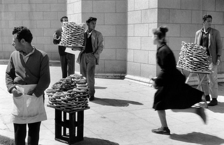 Sabine Weiss.
Street vendor of coulourias, Greece.1958. 
© Sabine Weiss/Rapho