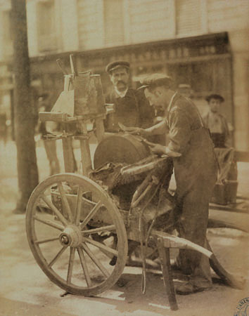 Eugene Atget.
Grinders At Work. 
Collection of the City of Paris Historical Library