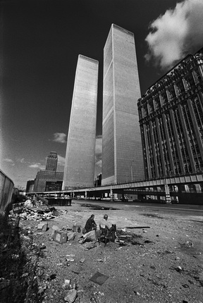Jean-Pierre Laffont.
World Trade Center Homeless
Manhattan, New York, NY - October, 1975. 
Two homeless men squat in the shadow of the recently completed World Trade Center. New York City was on the verge of bankruptcy and World Trade Center sat largely vacant.
© Jean-Pierre Laffont / from the book “Photographer's Paradise. Turbulent America 1960-1990” (Glitterati)