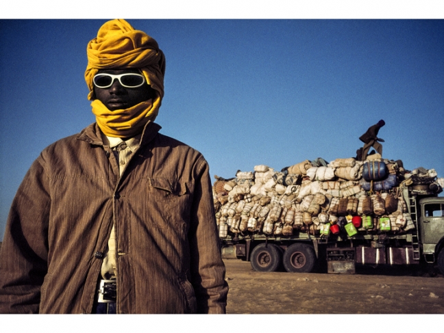 Pascal Maitre.
Niger, 2007.

A migrants’ truck in the Tenere Desert. Thousands of people, mostly from Nigeria, Ghana and Mali, cross the daunting desert hoping to find work in Libya or to reach Europe.

© Pascal Maitre/Myop/Panos.