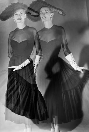 Janine Niepce.
Black dress from Lanvin. 
1950. 
Faubourg Saint - Honore str., Paris 
©Janine Niepce/RAPHO