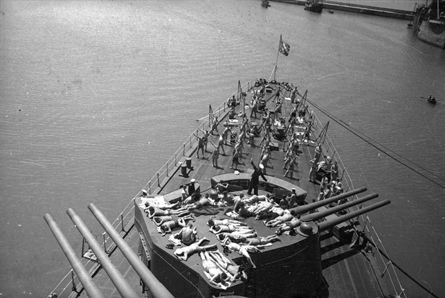 The sailors sunbathe on the deck of the Molotov cruiser. Sevastopol. 1944