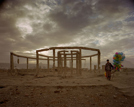 Simon Norfolk.
Former tea house in a park next to the Afghan Exhibition of Economic and Social Achievements in the Shah Shahid district of Kabul. Balloons were illegal under the Talibans, but now the balloon-sellers are common on the streets of Kabul