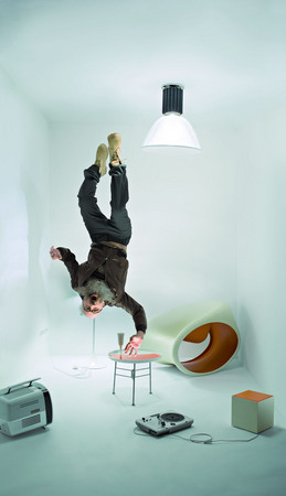 Vladimir Vasilchikov.
To reach the ceiling. 
2008. 
Artist Oleg Kulik. 
ESQUIRE