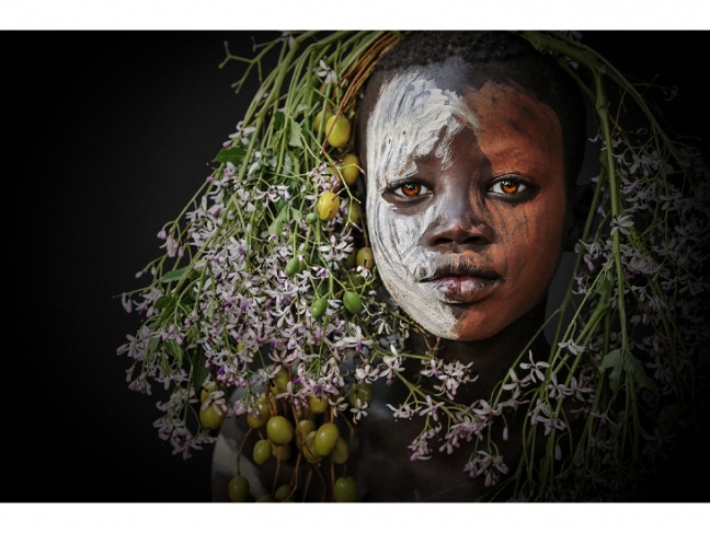 Olga Michi. Portrait of a boy. Surma ethnic group. Ethiopia. 2017.
