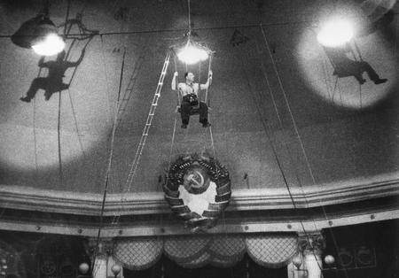 Alexander Rodchenko.
Press photographer George Petrusov under a dome of a circus. 
1940. 
Private collection