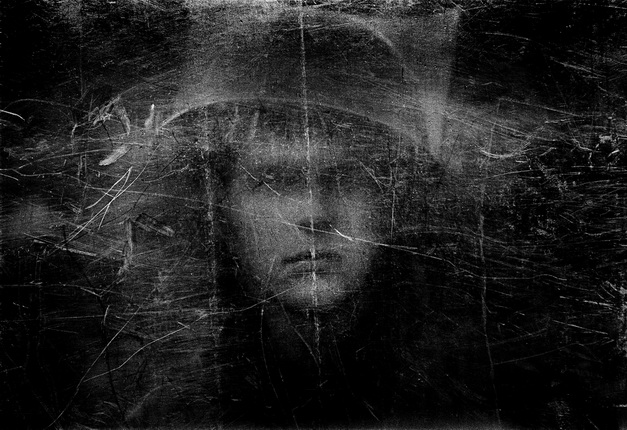 Philip Jones Griffiths.
Soldier seen through shield.
Northern Ireland, 1973.
Courtesy of the Philip Jones Griffiths Foundation and Trolley Books.
© Philip Jones Griffiths Foundation