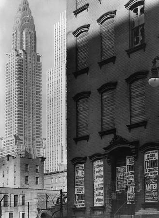 Berenice Abbott.
Contrasting 331 East 39th street with Chrysler building and Daily News building. 
November 9, 1938. 
Museum of the City of New York