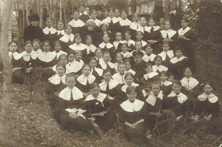 Unknown author.
Group portrait of 2-nd class of Nikolskaya female grammar school.