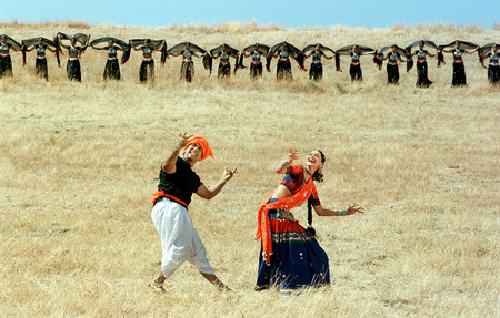 Jonathan Torgovnik.
Govinda and Sunali Bendre during a song sequence on the set of “In the Land Where the Ganges Lives”; Panjgani, Maharashtra. Actors Govinda and Sunali Bendre, during a song sequence on the set of “Jis Desh Mein Ganga Rehta Hai”.
2000. 
Presented by Admira, Milan