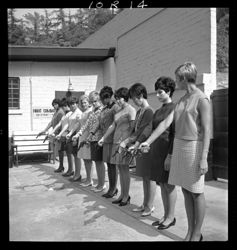 Unknown.
Woman officers practice at shooting range-Fire arms inspection-Girls with Guns. 
08.10.1968.
Gelatin silver print.
Courtesy Fototeka Los Angeles